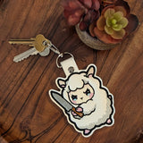 Cute faux leather keyring featuring sword‑wielding sheep design